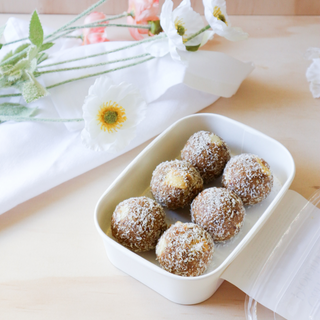 Carrot Cake Protein Balls showing pieces of juicy pineapple and white chocolate chips 