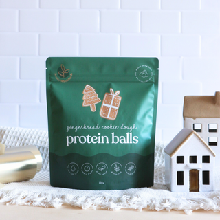 Gingerbread Cookie Dough Protein Ball Mix packet, perfect for creating festive, plant-based, gluten-free, high-protein Christmas snacks made from real ingredients.