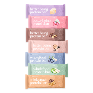 Sneaky Wholefoods Office Bar Bundle featuring all 7 Protein Bars, showcasing a variety of flavors in vibrant packaging, perfect for energizing the team during work hours